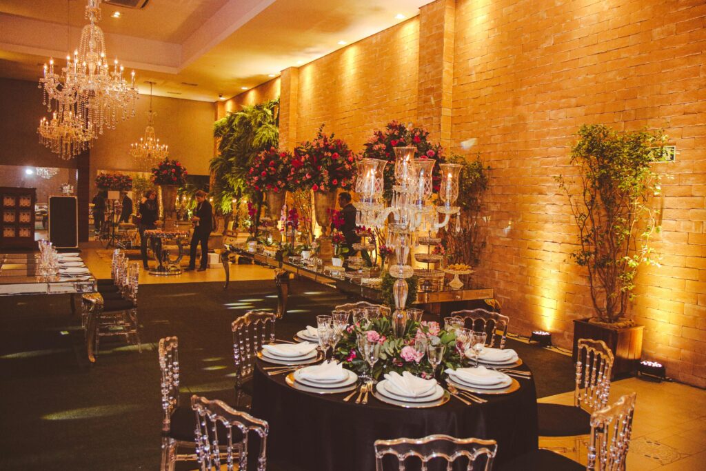 pexels-photo-12689028-12689028 Opulent ballroom with exquisite chandeliers and elegant table settings, perfect for upscale events.